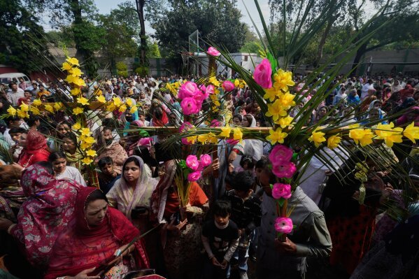 Pakistani Christians attend a Palm Sunday Mass at St. Anthony Church in Lahore, Pakistan, Sunday, March 29, 2026. (AP Photo/K.M. Chaudary)