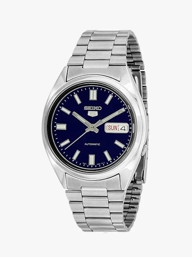 Image may contain: Wristwatch, Arm, Body Part, and Person