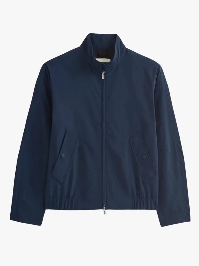 Image may contain: Clothing, Coat, Jacket, Fleece, Blouse, Blazer, Long Sleeve, and Sleeve