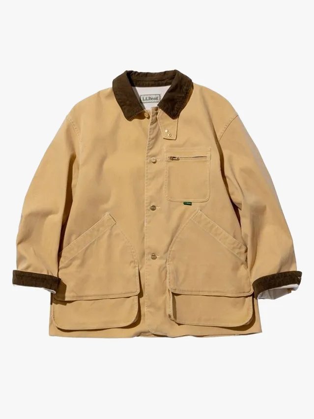 Image may contain: Clothing, Coat, Jacket, Khaki, and Blazer