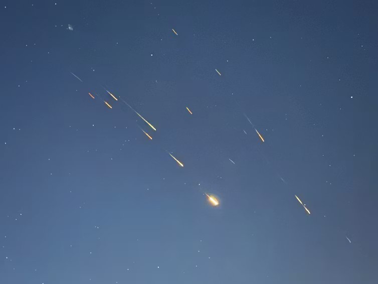 Missile traces are seen in the sky.