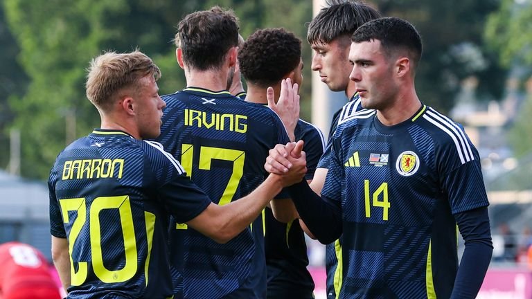 VADUZ, LIECHTENSTEIN - JUNE 08: Scotland's Che Adams (C) celebrates scoring to make it 4-0 with teammates (L-R) Connor Barron, Andy Irving, Kieron Bowie and Lennon Miller during an International Friendly match between Liechtenstein and Scotland at Rheinpark Stadion, on June 08, 2025, in Vaduz, Liechtenstein. (Photo by Craig Williamson / SNS Group)