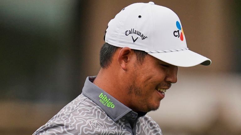 Si Woo Kim, of South Korea, walks off the third tee during the final round of the RBC Heritage