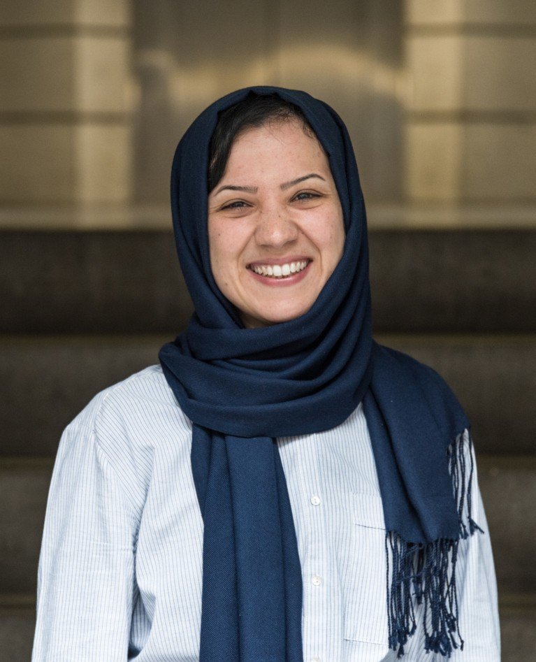 Abideh Jafari smiling for a formal portrait.
