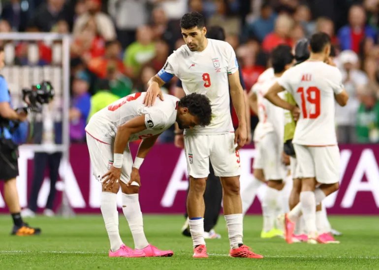 Soccer Football - FIFA World Cup 2026 - Group G - Egypt v Iran - Seattle Stadium, Seattle, Washington, U.S. - June 26, 2026 Iran's Ramin Rezaeian and Mehdi Taremi look dejected after the match REUTERS/Carlos Barria