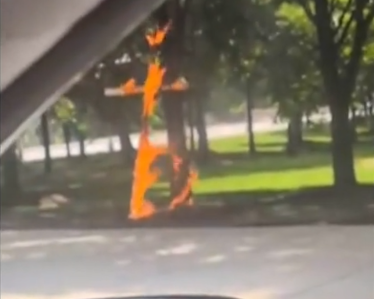 A burning cross in a Chicago park shocks residents