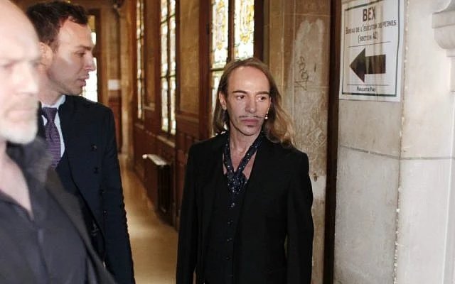 Former Dior designer John Galliano arrives at a Paris court house to face charges for hurling anti-Semitic slurs at a Paris cafe, in June 2011 (photo credit: AP/Thibault Camus)
